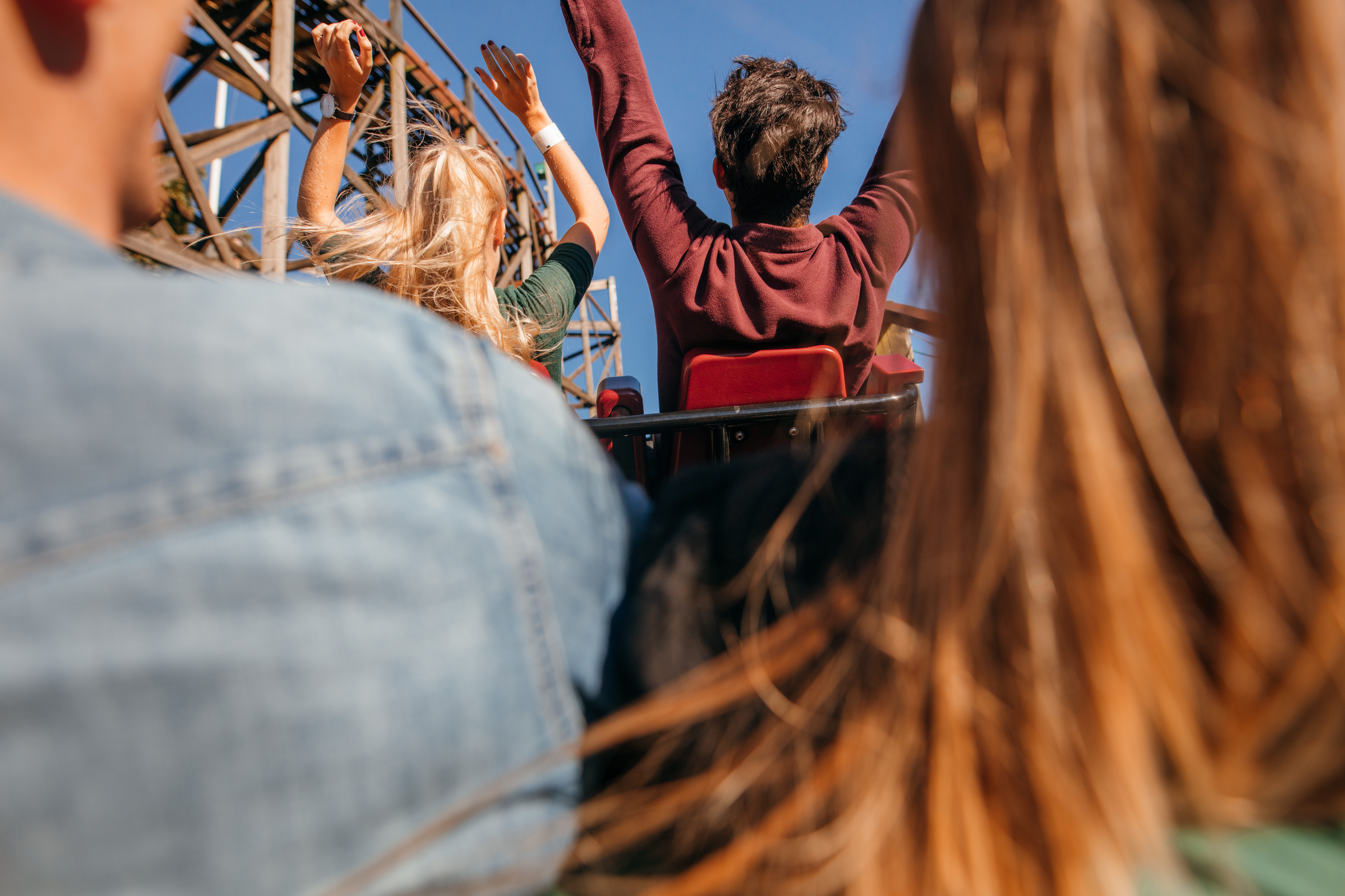 people riding a roller coaster